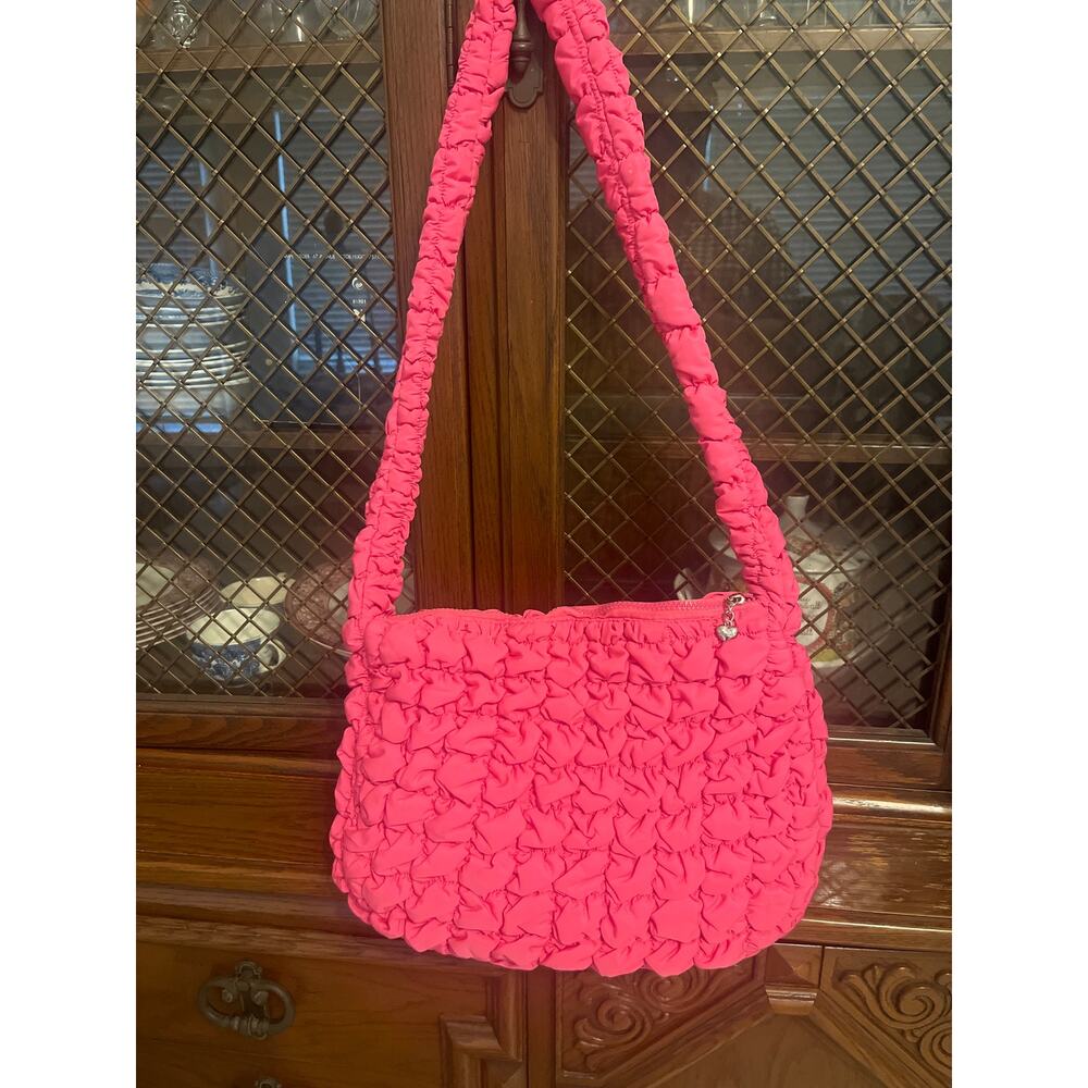 Pink Hobo bag with single strap design lightweight...zip-up pocket